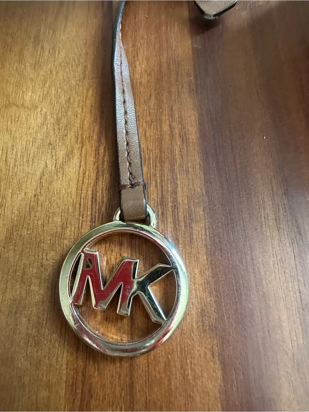 Michael Kors Brown Leather Strap Keyring with Gold MK Emblem and Red Inset